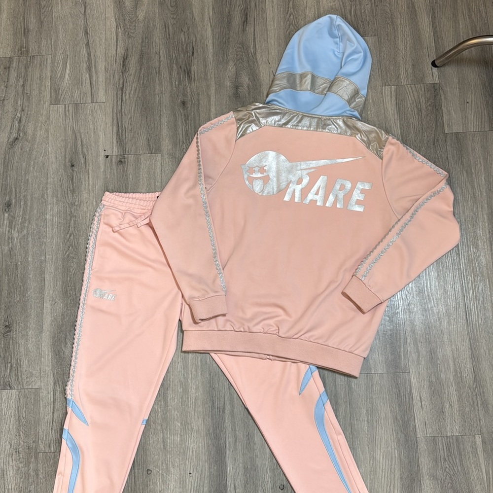Rare Pink Dolphin tracksuit small stain on arm, barely noticeable
